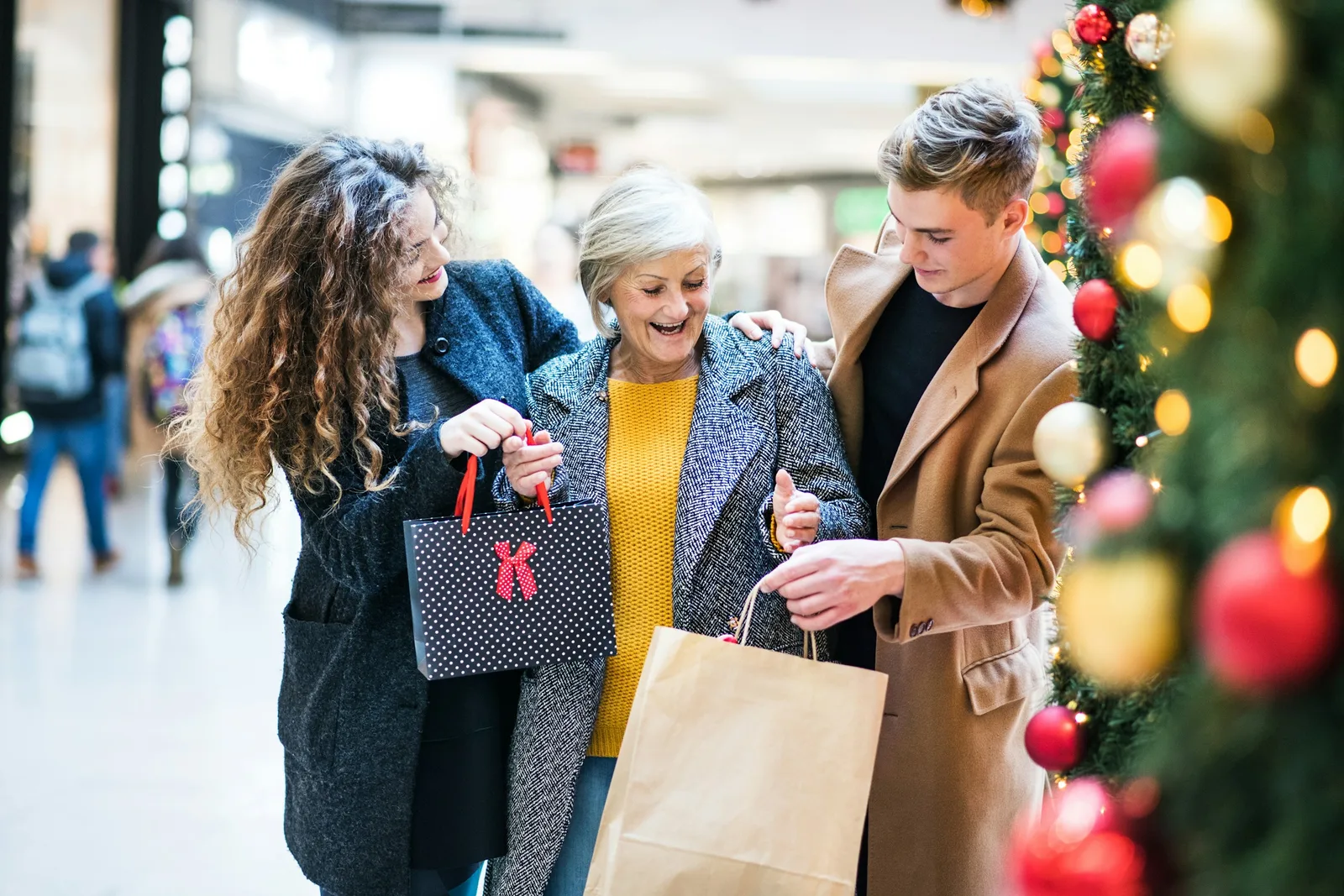 A family browsing festive gifts and wrapping paper together
